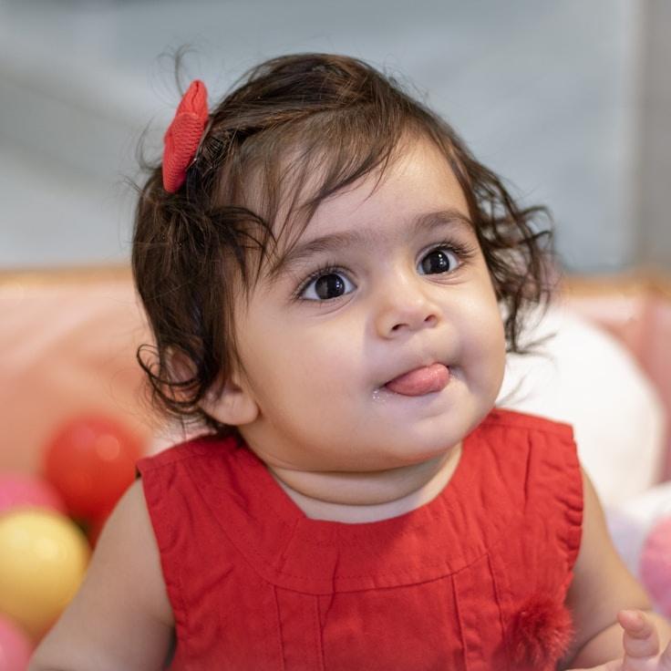 Avery Chen, Lead Design Curator at Verdant & Vine, reviewing corporate floral arrangements